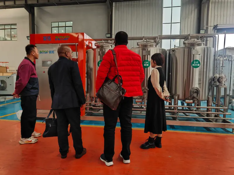 INTOP establece con éxito una línea de producción de bebidas con agua purificada en Tanzania